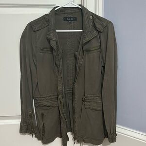 NWOT Green zippered jacket in women’s size S